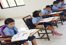 Holy Cross students learning in their classroom